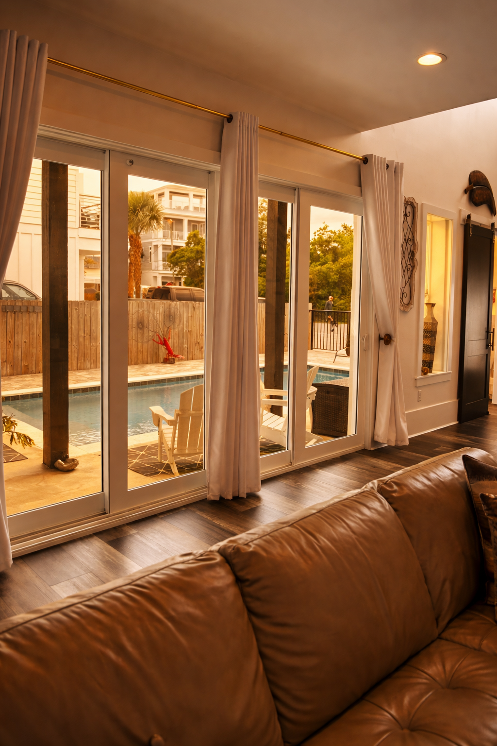 Living room with pocketing pool sliders